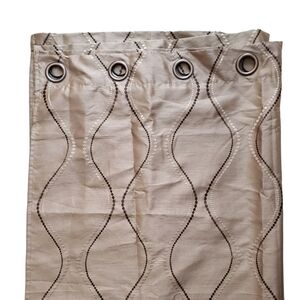 BROWN and cream stitching on tan drapes.